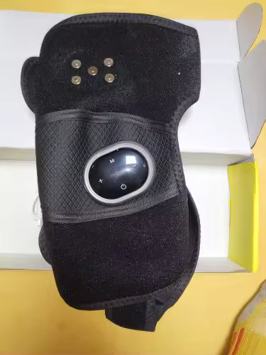 Customer photo of a compact black MotionNest massage wrap
