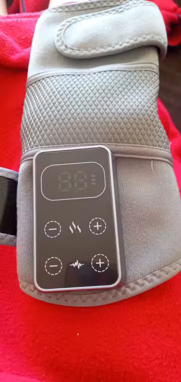 Customer photo of a gray MotionNest massager